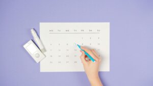 A student highlighting the SAT registration date