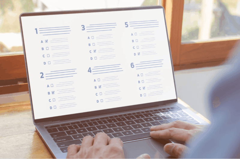 Man taking the new Digital SAT test.